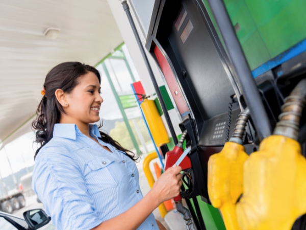 Woman at a Gas Pump
